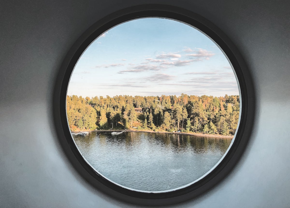 View through a porthole of a landscape
